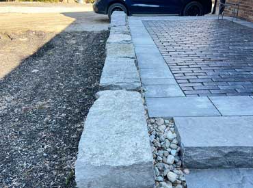 stone wall and paving