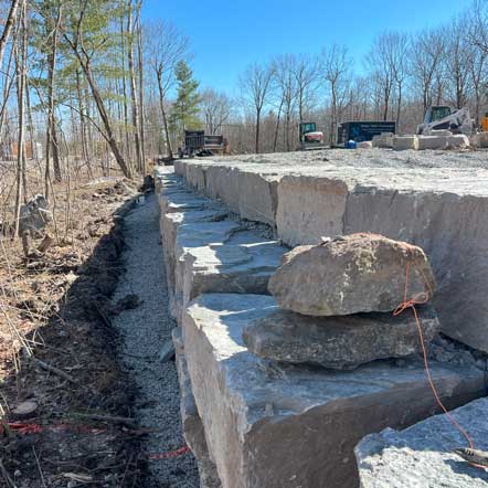 Grey heavy stone wall